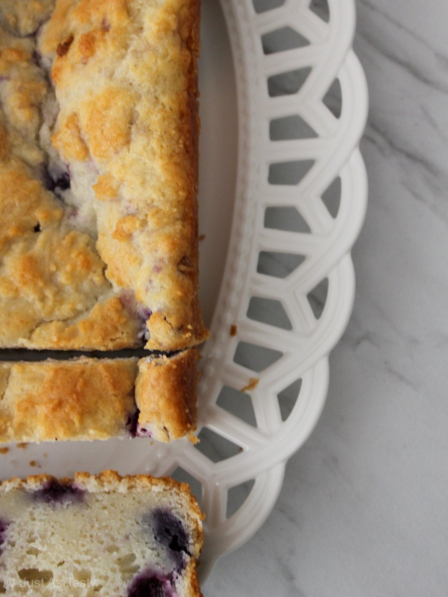 Lemon blueberry loaf on a white platter