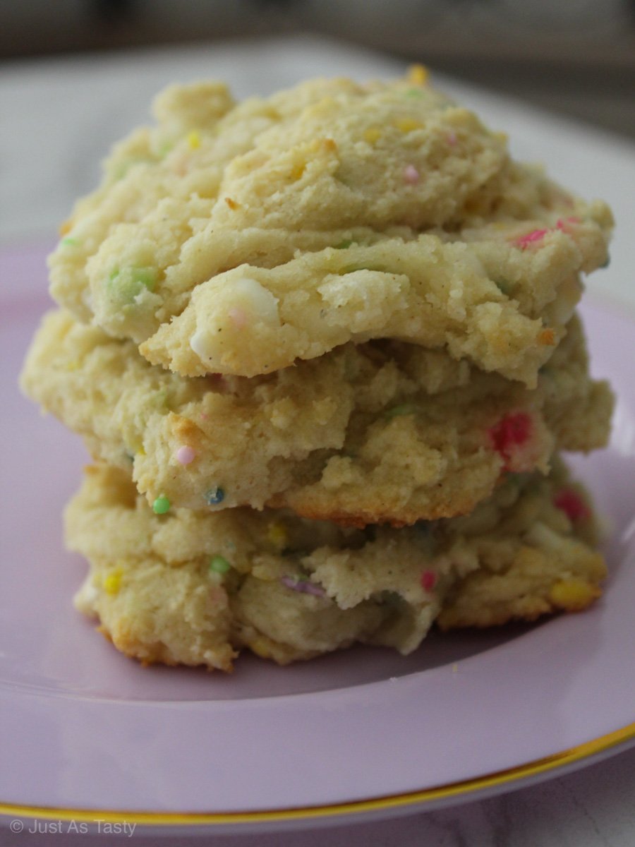 Stack of funfetti cookies on a purple plate.