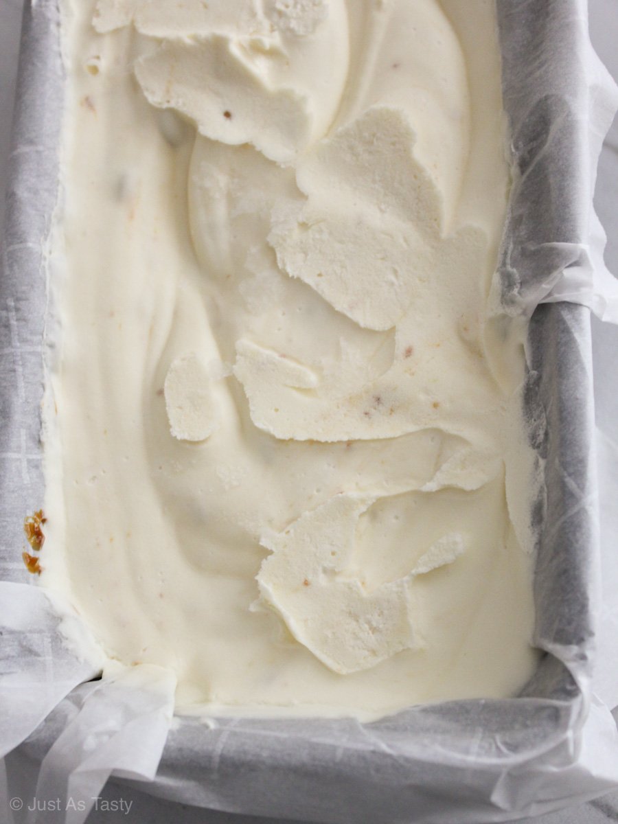 Salted caramel ice cream without eggs in a loaf pan.