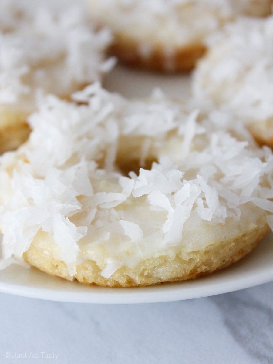 Close-up of donut topped with coconut flakes