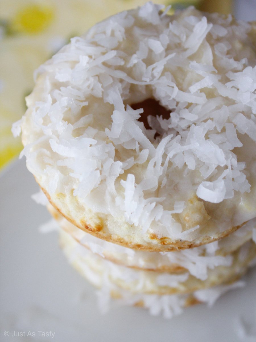 Close-up of stacked donuts topped with coconut flakes
