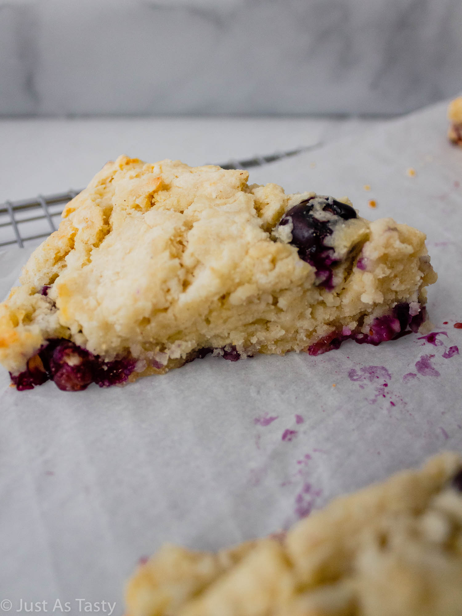 Close-up of a gluten free blueberry scone.