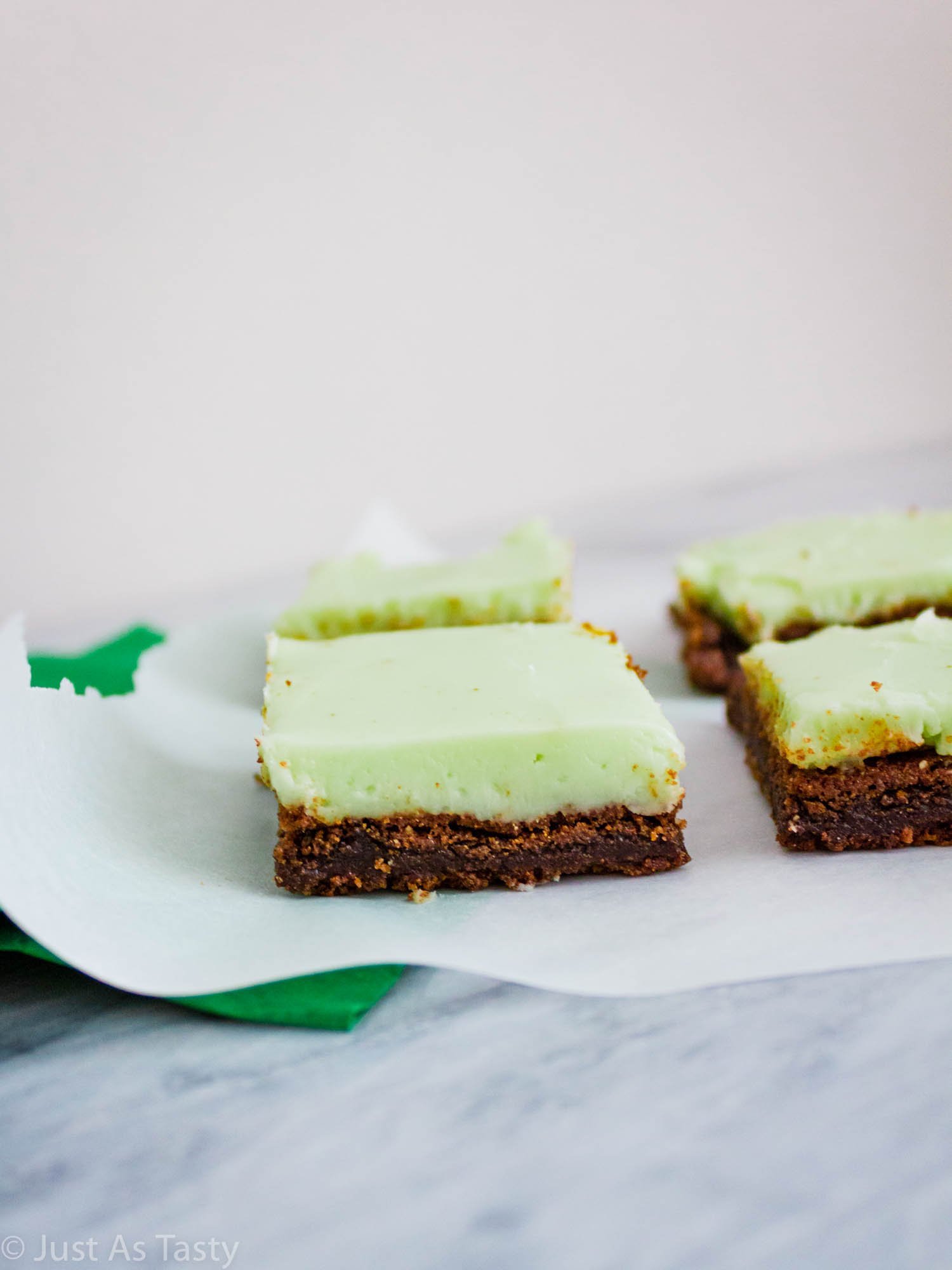 Grasshopper brownies on white parchment paper. 