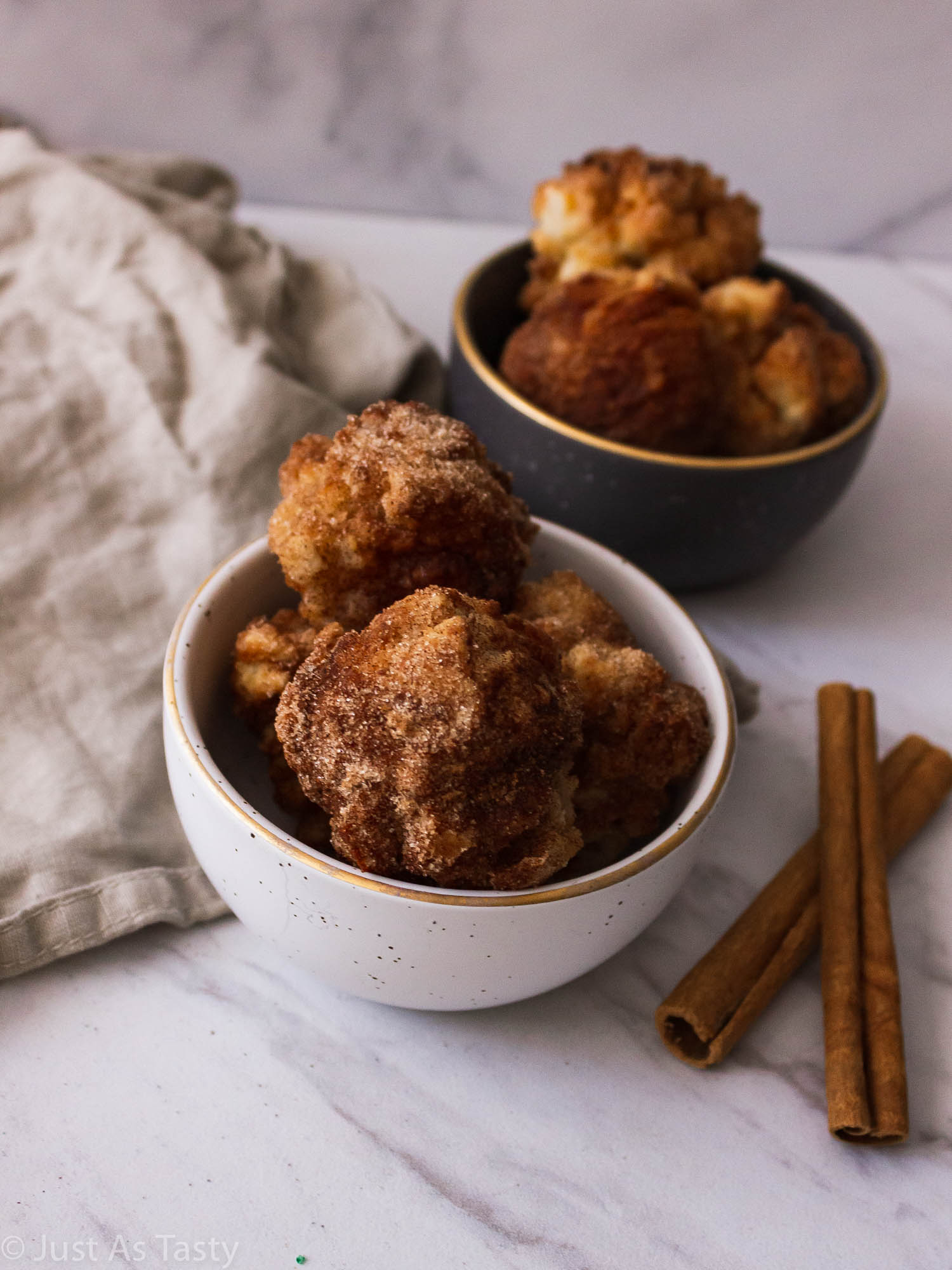 Cinnamon bites in two small bowls.