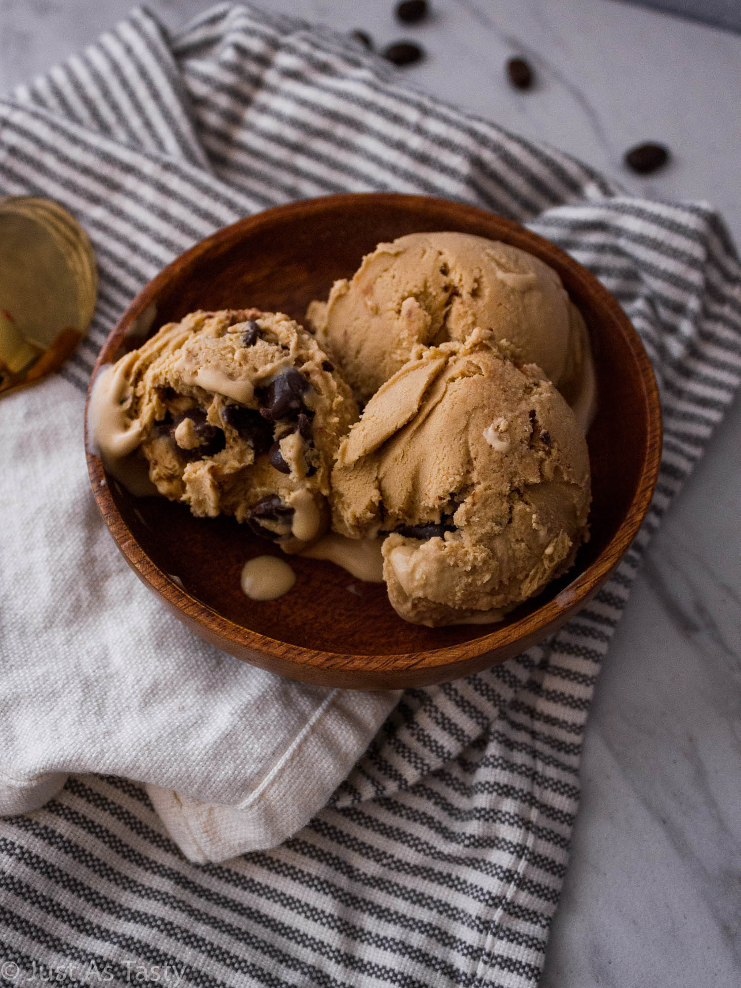 Scoops of no-churn ice cream in a wooden bowl.